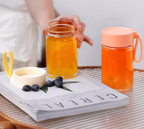 Borosilicate Glass Travel Mug with Insulated Sleeve & Integrated Handle